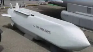 A Storm Shadow long-range cruise missile mounted under the wing of a Eurofighter Typhoon fighter jet.